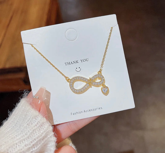 Infinity Pendant With Small Heart
